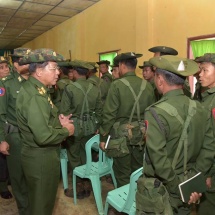 Senior General Min Aung Hlaing cordially meets servicemen and wives from local battalion headquarters in Shaduzup Village in Tanai Township for their brave combats on KIA insurgents who attacked the headquarters of the local battalion