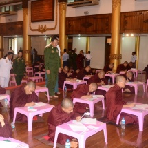 Senior General Min Aung Hlaing, wife Daw Kyu Kyu Hla and family offer day meal to monks, novices and nuns taking the 31st Sasanawunhsaung Thamanekyaw oral exam 