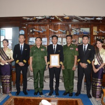 Commander-in-Chief of Defence Services presents certificate of honour to captain and crew for landing their plane safely 