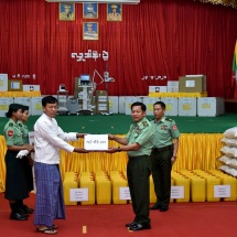 Ceremony to donate necessary COVID-19 treatment medicines and medical equipment and cash assistance for displaced persons and Tatmadaw members serving military duties held