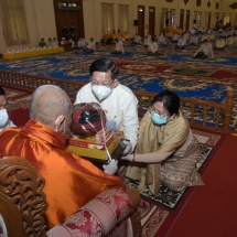 Chairman of State Administration Council of Republic of the Union of Myanmar Senior General Min Aung Hlaing and wife Daw Kyu Kyu Hla offer day meal to Sayadaws who will receive religious titles for 2021
