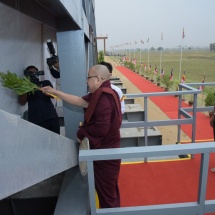 Auspicious ceremony to convey the part one of sitting marble Bhumi Phassa Mudra Buddha Image from Hsimeegon port to Nay Pyi Taw held