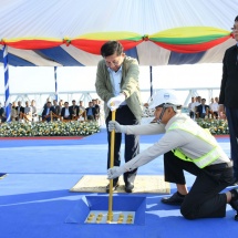 SAC Chairman Prime Minister Senior General Min Aung Hlaing fixes gold nut at connection of structures at Bago River Bridge (Thanlyin Bridge-3)