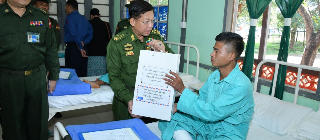 Chairman of State Administration Council Commander-in-Chief of Defence Services Senior General Min Aung Hlaing and Daw Kyu Kyu Hla cordially gives warm words of encouragement to officers and other ranks and MPF members, wounded while discharging national defence and security duties