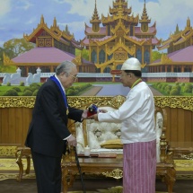 Chairman of State Administration Council Prime Minister Senior General Thadoe Maha Thray Sithu Thadoe Thiri Thudhamma Min Aung Hlaing presents honorary and performance titles to former Japanese Prime Minister and Japan-Myanmar Friendship Association chairman