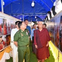 Chairman of State Administration Council Commander-in-Chief of Defence Services Senior General Min Aung Hlaing and Daw Kyu Kyu Hla look into the requirements of preparations to hold the funeral rites of Patron Sayadaw of Naga Hnakaung Monastery in Tachilek successfully