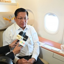 SAC Chairman Prime Minister Senior General Min Aung Hlaing who attended the the military parade to mark the 80th Anniversary of the Victory in the Great Patriotic War 1941-1945 of the Russian Federation gives interviews to media onboard the special flight on his return to Myanmar
