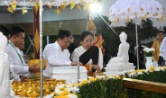 SAC Chairman Prime Minister Senior General Min Aung Hlaing, his wife Daw Kyu Kyu Hla, council members and their wives join water-pouring ceremony at banyan trees on full moon of Kason
