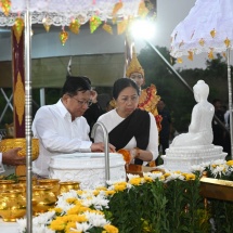 SAC Chairman Prime Minister Senior General Min Aung Hlaing, his wife Daw Kyu Kyu Hla, council members and their wives join water-pouring ceremony at banyan trees on full moon of Kason