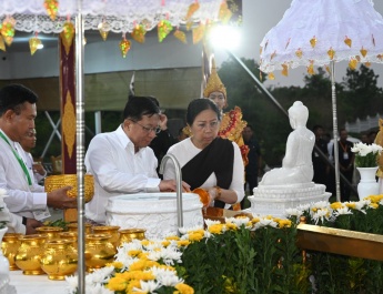 SAC Chairman Prime Minister Senior General Min Aung Hlaing, his wife Daw Kyu Kyu Hla, council members and their wives join water-pouring ceremony at banyan trees on full moon of Kason