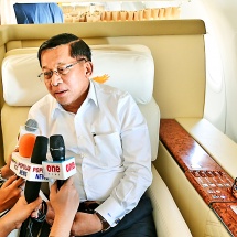 Acting President and SSPC Chairman of the Republic of the Union of Myanmar Senior General Min Aung Hlaing replies to questions raised by media aboard the special aircraft