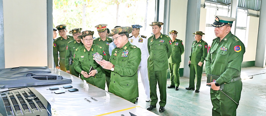 SSPC Chairman Commander-in-Chief of Defence Services Senior General Min Aung Hlaing inspects assembling and manufacturing of agricultural machinery and automobiles at local Tatmadaw Heavy Industries in Hsinde and Htonbo